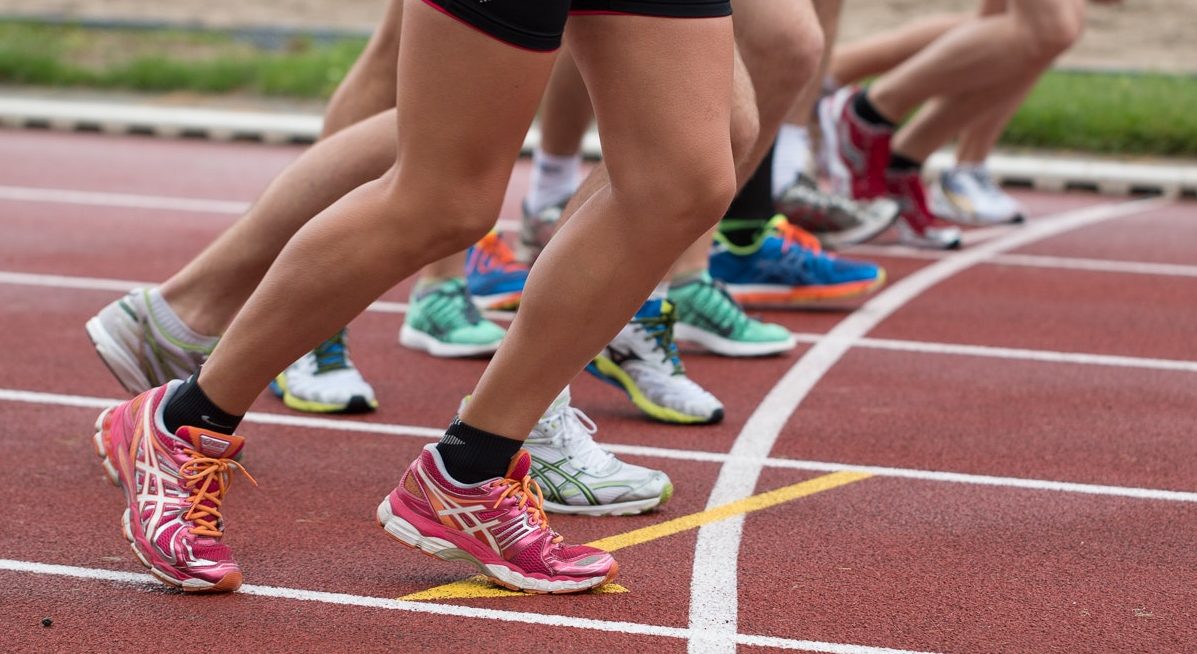 Runners feet on a track lining up to race