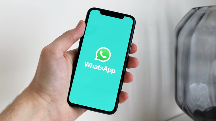 Mobile phone with Whatsapp logo displayed