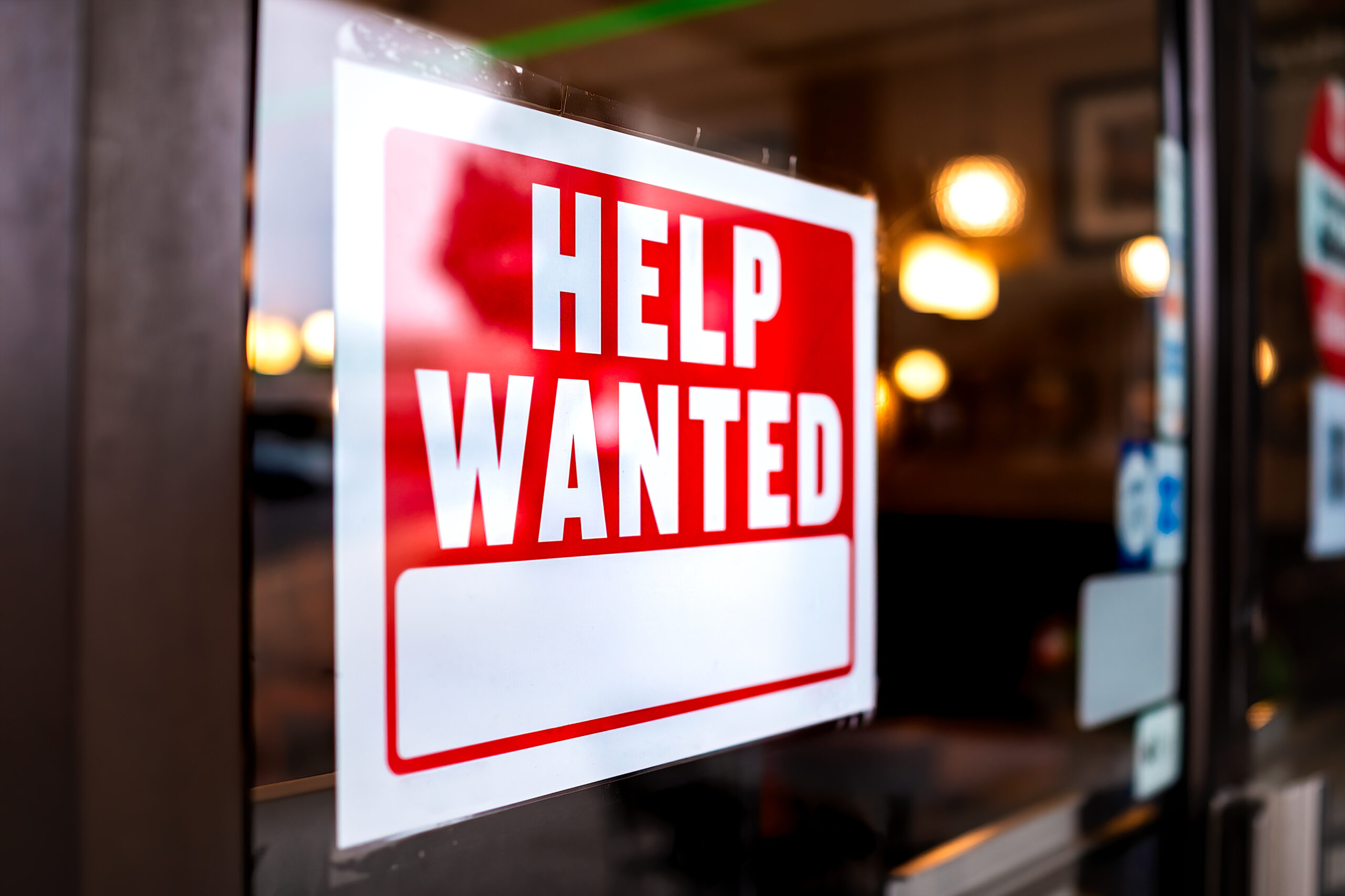 Help wanted sign in a window