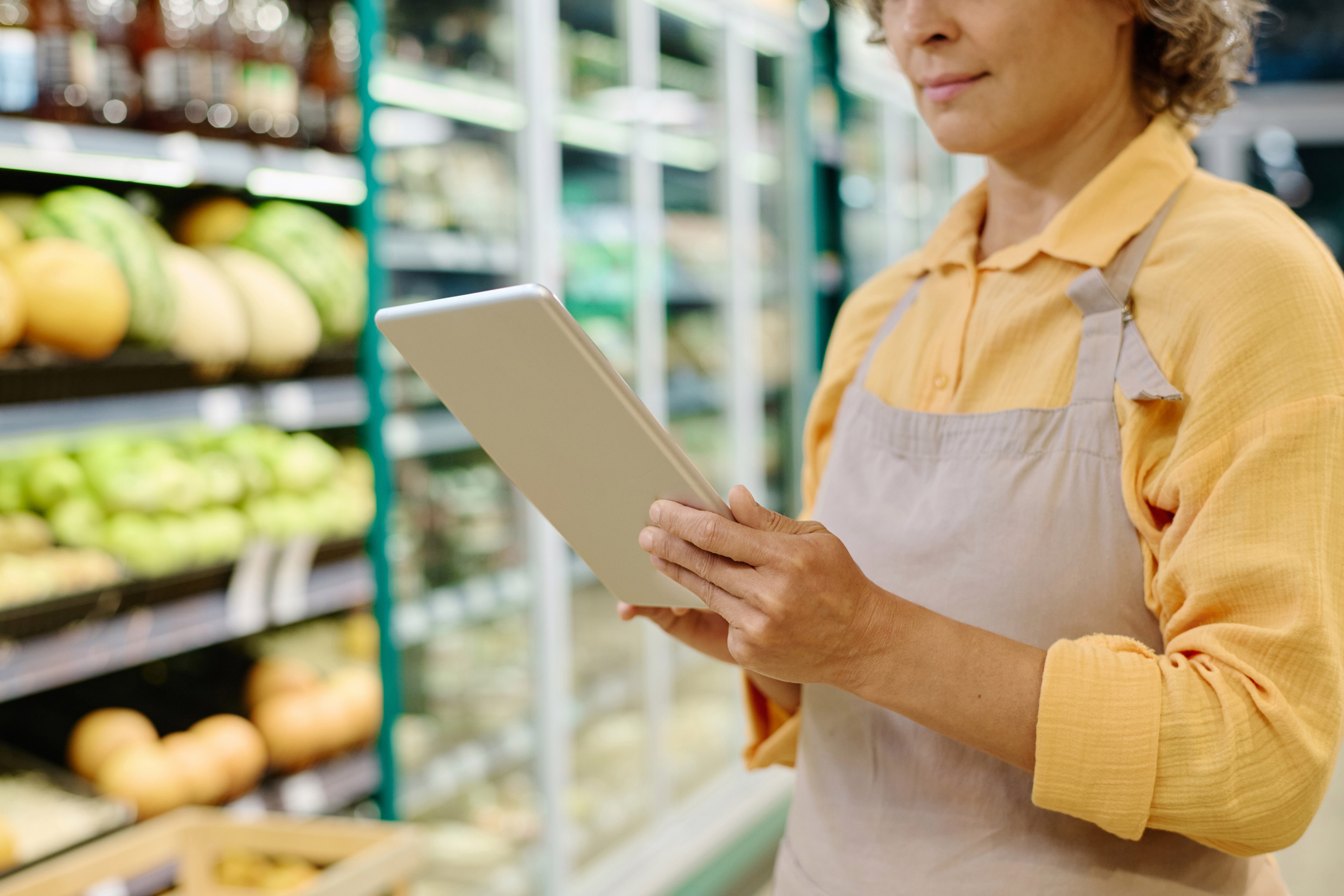 Manager Of Supermarket Using Tablet Pc