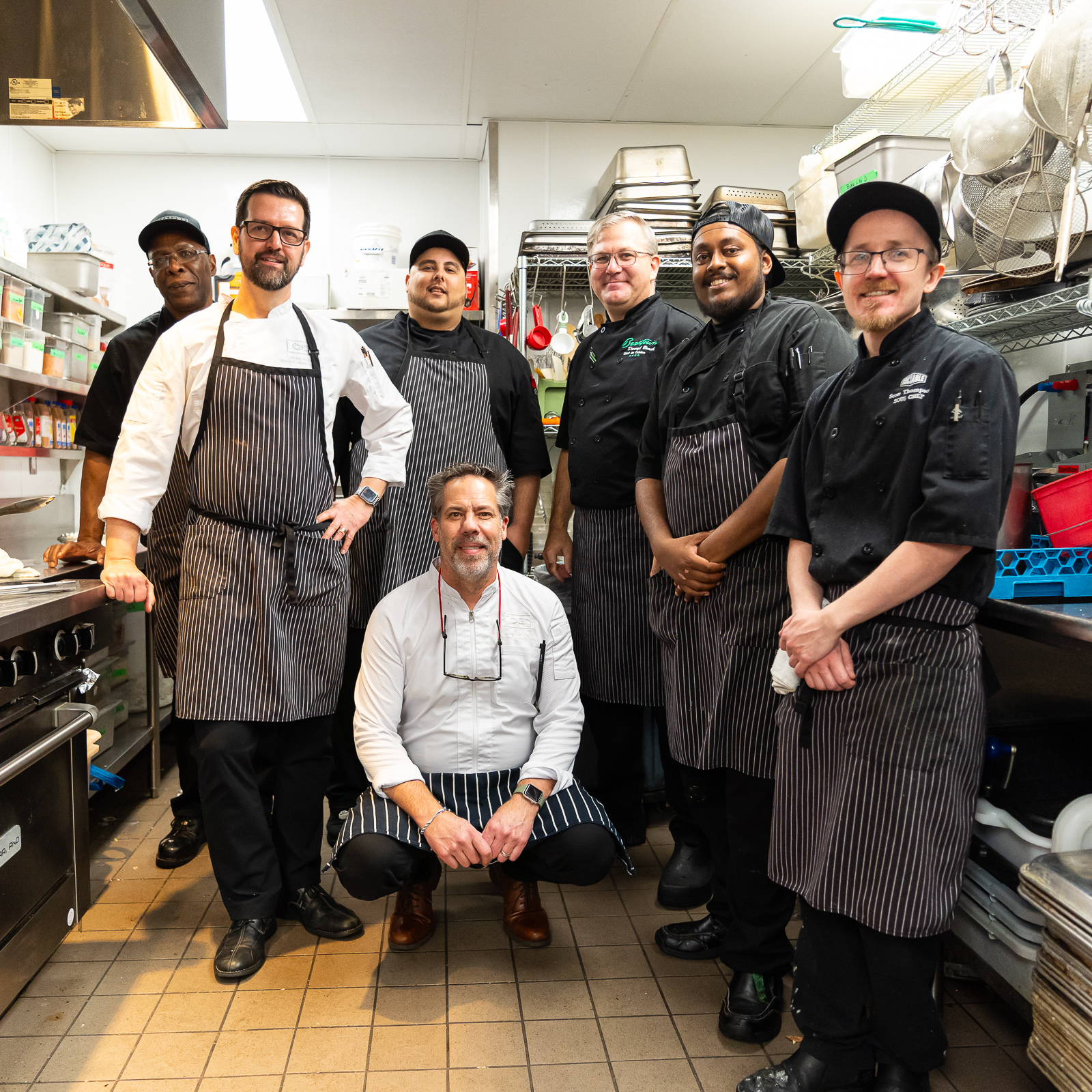 Charcoal Group Chef's standing