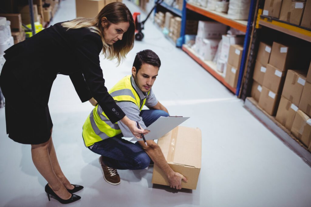 Manager Showing Clipboard To Worker