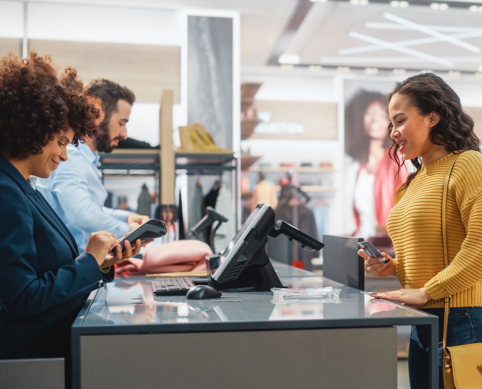 A woman making a purchase in a retail store