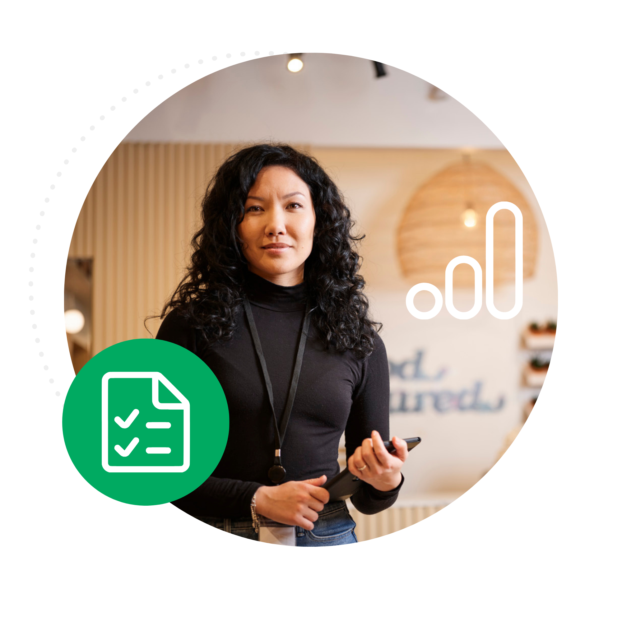 Photo of a store manager holding a tablet