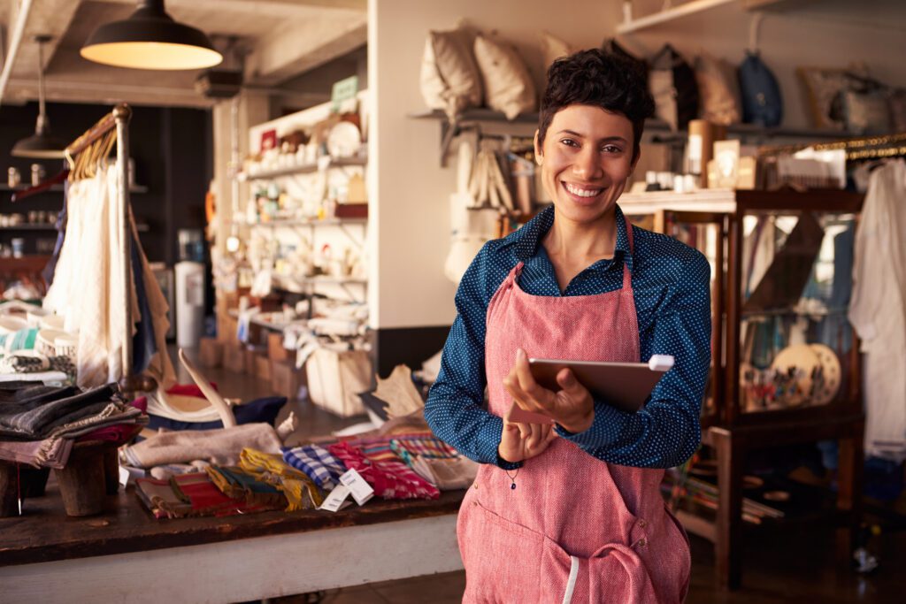 Portrait Of Female Owner Of Gift Store With Digital Tablet
